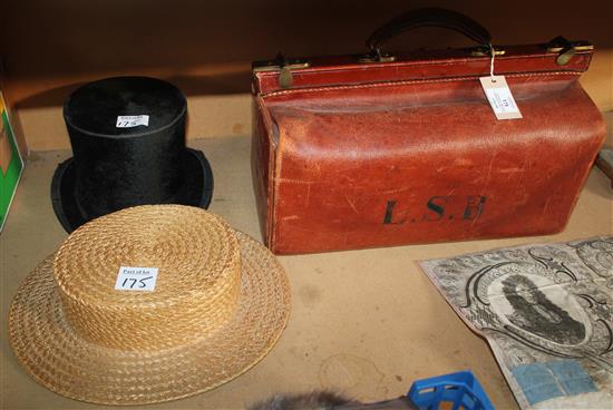 Bicorn hat, two fez, a straw boater and 2 top hats and a gladstone bag